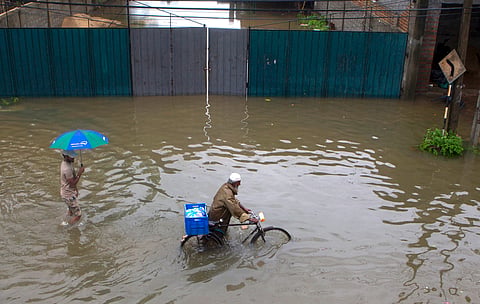 Nearly 400 homes were damaged in mudslides, with over 1,100 families moved to temporary shelters.