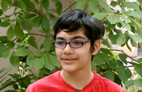 Tanishq Abraham, 12, talks about his recent graduation from community college and beginning his university education this fall, in an interview at American River College in Sacramento, Calif. (AP)