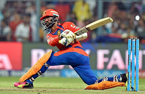 Gujarat Lions Dinesh Kartik in action against KKR at Eden Garden in Kolkata on Sunday. | PTI
