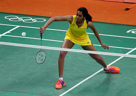 India's Sindhu Pusarla returns a shot against Hungary's Laura Sarosi during a women's badminton match at the 2016 Summer Olympics in Rio de Janeiro, Brazil, Thursday, Aug. 11, 2016. | AP