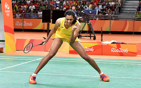 India's Pusarla V Sindhu reacts after winning a point against Spain's Carolina Marin in women's Singles final at the 2016 Summer Olympics at Rio de Janeiro in Brazil on Friday. | PTI