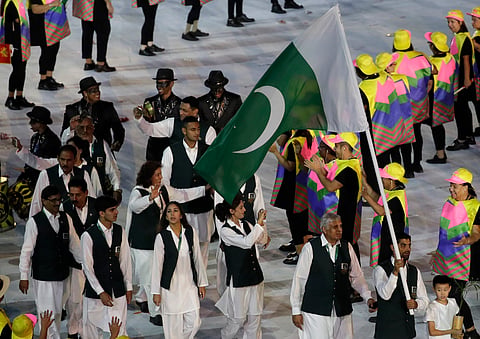 Ghulam Mustafa Bashir carries the flag of Pakistan during the opening ceremony for the 2016 Summer Olympics in Rio de Janeiro, Brazil. |AP