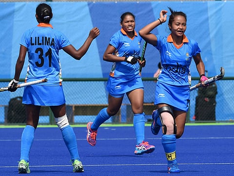 Indian women hockey players celebrate a goal against Japan during opening match of pool B at the Rio Olympic 2016 in Rio de Janeiro Brazil on Sunday. | PTI