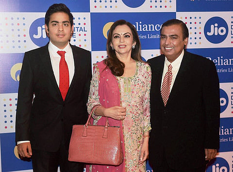 Mukesh Ambani Chairman Reliance Industries Ltd. with his wife Nita Ambani and son Akash Ambani arrives for the company's annual general meeting in Mumbai on Thursday. | PTI
