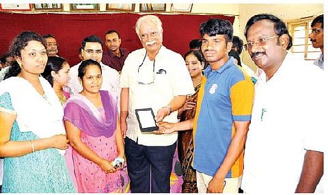 Twenty E-book readers donated to Gurajada Central Library by Ashok Gajapathi Raju 
