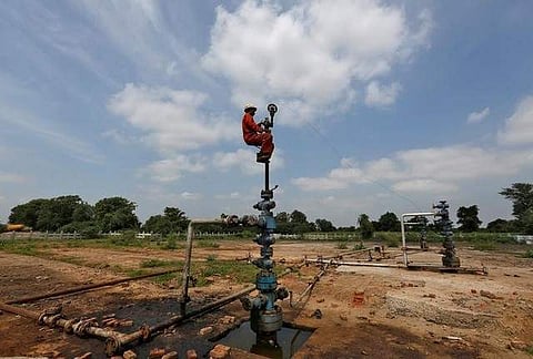 A technician works at the Oil and Natural Gas Corp (ONGC) wells at its oil field on the outskirts of Ahmedabad. (File photo | Reuters)