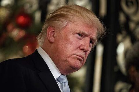 President-elect Donald Trump listens to a question as he speaks to reporters at Mar-a-Lago in Palm Beach on December 28. (Photo | AP)