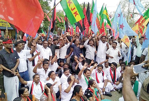 A protest held  under the auspices of the DMK and farmers’ organisations in front of the Aanakatti checkpost in Attappadi on Sunday. (File photo)