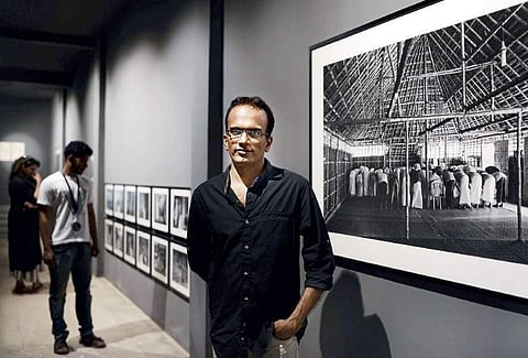 Artist K R Sunil at the   ‘Vanishing worlds’ exhibition  at Aspin Wall, Fort Kochi   Express