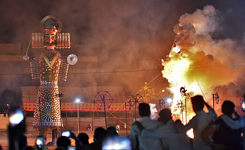 Effigies of Ravana and his brother Kumbhakaran being set on fire during Dussehra celebrations. (Photo | PTI)