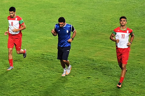 Younes Delfi (extreme R), in the match against Germany, combined well with strike partner Allahyar Sayyad and was the undisputed star of the show.  | Express Photo Service