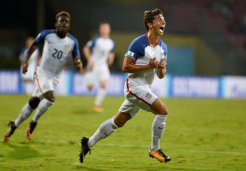 USA player George Acosta celebrates his goal against Colombia. In the first 22 minutes, USA had the better share of ball possession, but they failed to find the equaliser. USA's equaliser came in the 24th minute, courtesy a stunning right-footer by Acosta