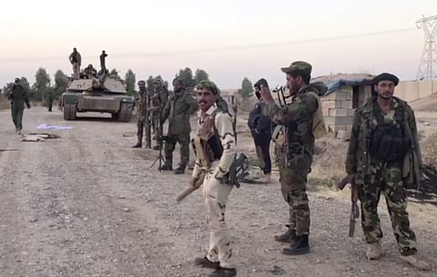 Iraqi soldiers in the Qatash area towards Kirkuk gas plant, south of Kirkuk, Iraq on Monday | AP
