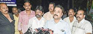 Kapu Corporation MD R Amarendra Kumar holds a press conference in the middle of the road at Suryaraopet in Vijayawada on Sunday | Express