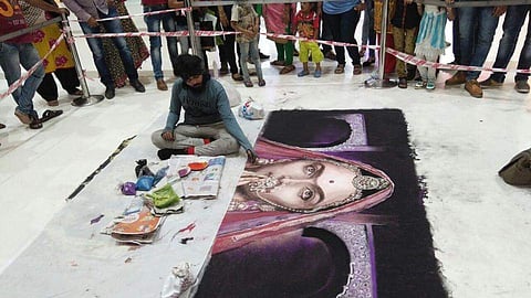 Artist's rangoli of Padmavati poster at Surat mall wiped out in seconds by 'goons'. (Twitter Photo | KK Solanki‏ @kartiksolanki09)
