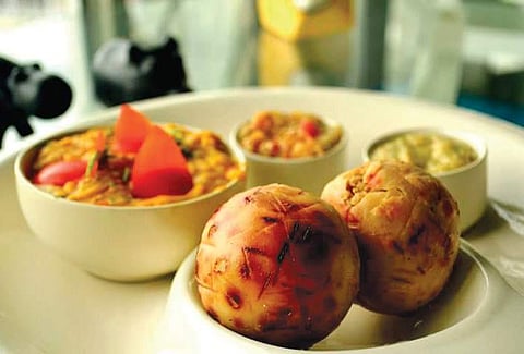 Litti platter offered at PotBelly; (left, inset) littis in the making
