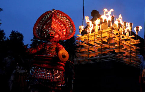 Vishakandan Theyyam performing at Kolachery Chathambali Vishakandan Temple in Kannur marking the beginning of Theyyam season in Malabar, Kerala on Friday. (EPS | A Sanesh)