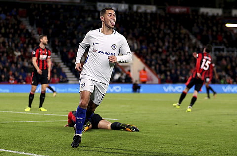 Chelsea's Eden Hazard celebrates scoring his side's first goal of the game during their English Premier League soccer match against AFC Bournemouth at the Vitality Stadium, Bournemouth, England, Saturday, Oct. 28, 2017. | AP