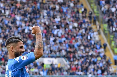 Napoli's Lorenzo Insigne celebrates after scoring during the Serie A soccer match between Napoli and Sassuolo | AP