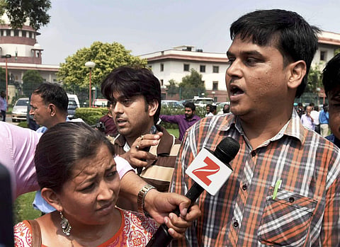 Father of  Pradyuman Thakur talks to the media outside the Supreme Court in New Delhi after the incident | PTI