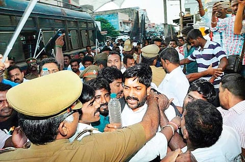 MLA Vaiyapuri Manikandan and AIADMK cadre staging a protest against Lieutenant Governor Kiran Bedi in Puducherry on Sunday  | Express