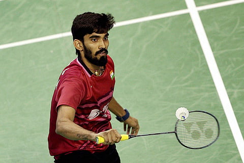 India's Srikanth Kidambi plays a shot against Japan's Kenta Nishimoto during their men's final match of the French Open badminton tournament in Paris Sunday Oct. 29 2017. | AP