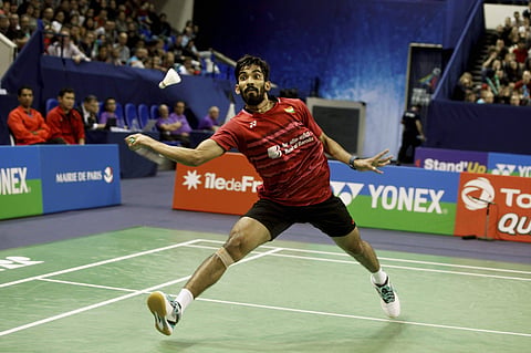 India's Srikanth Kidambi plays a shot against Japan's Kenta Nishimoto during their men's final match of the French Open badminton tournament in Paris Sunday Oct. 29 2017. | AP