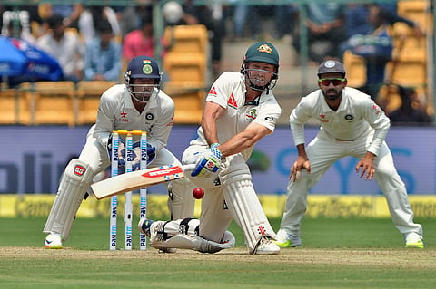 Australia's opening batsman Matt Renshaw plays a sweep shot action against India in the second Test match against India at the M Chinnaswamy Stadium, Bengaluru on March 5, 2017. | Express Photo by Jithendra M.