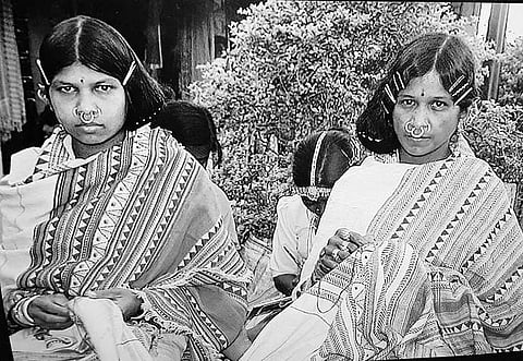 File photo of two Dongria  Kondh women weaving a Kapdagunda