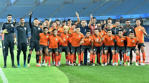 AIFF President Praful Patel poses for photo with the Indian team players before a practice session on the eve of their U-17 World Cup match against USA in New Delhi on Thursday. | PTI