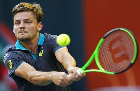David Goffin returns a shot to Adrian Mannarino during their men's singles final match of the Japan Open tennis tournament in Tokyo. | AP