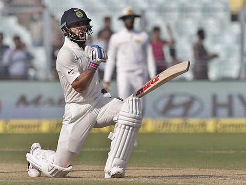 Indian captain Virat Kohli celebrates scoring his 18th Test ton | AP