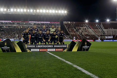 In this Oct. 31, 2017, Argentina's Lanus team poses for photographers during a semifinals Copa Libertadores soccer match against Argentina's River Plate in Buenos Aires, Argentina. | AP