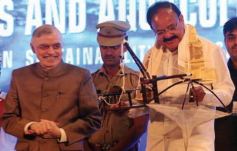 Vice-President Venkaiah Naidu with a model of Chinese Net gifted by J K Jena, chairman, AFSIB and Deputy Director General (Fisheries Science), Indian Council of Agricultural Research, at the inauguration of 11th Indian Fisheries and Aqua Culture Forum in 