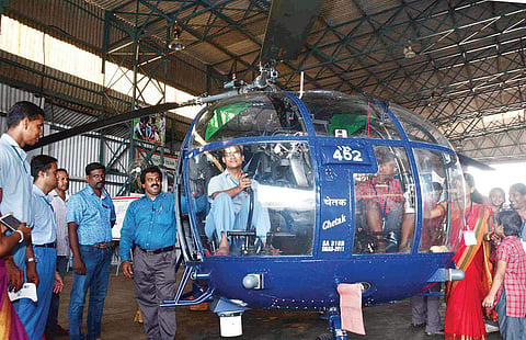 Special children being taken on board a naval helicopter