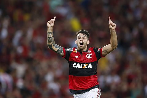 Felipe Vizeu of Brazil's Flamengo celebrates his goal during a Copa Sudamericana soccer match against Colombia's Junior at Maracana stadium. | AP