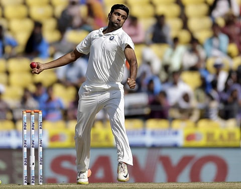 India's Ravichandran Ashwin bowls a delivery during the fourth day of their second test cricket match against Sri Lanka in Nagpur, India, Monday, Nov. 27, 2017. | AP