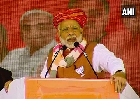 PM Narendra Modi addressing a rally in Gujarat's bhuj on Monday. (ANI)