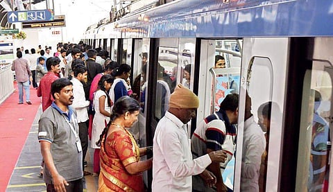 Passengers throng the Miyapur Metro station to take their first ride after the inauguartion and schoolchildren are seen taking selfies, in Hyderabad on Wednesday  | vinay madapu, Ajay moses