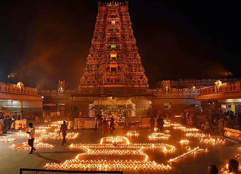 Devotees take part in Koti Deepotsavam on the occasion of Kartik Purnima at Goddess Kanaka Durga temple in Vijayawada.