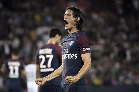 Cavani, signed from Napoli in 2013, reached the landmark on his 145th Ligue 1 appearance and joins a select club in having scored 100 times in two of Europe's big five leagues | AP