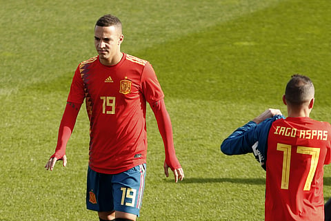 Spain's Rodrigo Moreno, wearing the new soccer kit for the 2018 World Cup, walks along the pitch with teammates during a training session in Las Rozas, outskirts Madrid, Spain, Wednesday, Nov. 8, 2017.| AP
