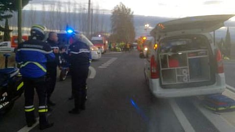 In this photo provided by France Bleu, rescue workers help after a school bus and a regional train collided in the village of Millas, southern France. | AP