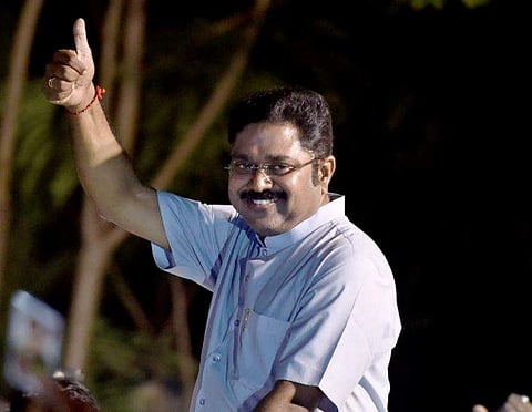 AIADMK leader T T V Dhinakaran celebrates after winning the RK Nagar constituency bypoll in Chennai on Sunday. | PTI