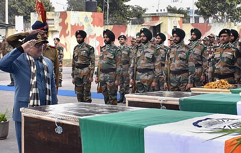 Jammu Jammu Kashmir Deputy Chief Minister Nirmal Singh paying homage to the slain Army Major and soldiers during a wreath laying ceremony in Jammu on Sunday.  | PTI