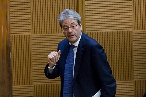 Italian Premier Paolo Gentiloni leaves after attending a year-end press conference in Rome, Thursday, Dec. 28, 2017.  | AP