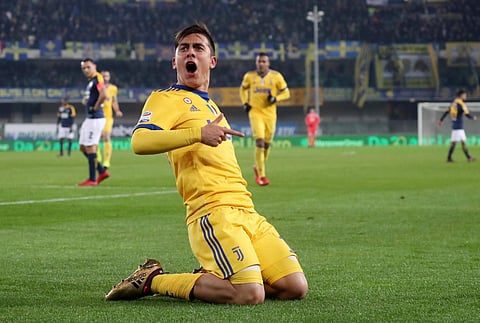 Juventus' Paulo Dybala celebrates after scoring during the Serie A soccer match against Hellas Verona. | AP