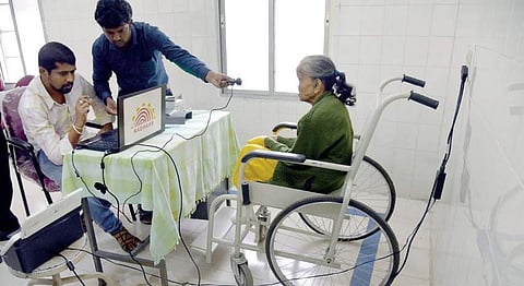 Aadhaar officials register 65-year-old Sajida Begum for the card at the Leprosy Hospital on  Magadi Road on Tuesday | Vinod Kumar T