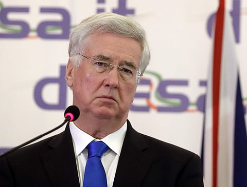 British Defense Secretary Sir Michael Fallon listens to a journalist's question during a joint statement with Italian Minister of Defense Roberta Pinotti, following their meeting, in Rome, Thursday, Feb. 9, 2017. | AP