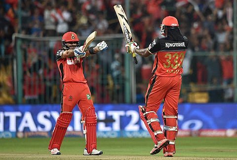 Bengaluru Royal Challengers Bangalore's Virat Kohli and Chris Gayle during an IPL 2016 match against Kings XI Punjab at Chinnaswamy Stadium in Bengaluru. | PTI